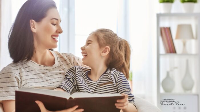 How to Plan a Homeschool Schedule - mom and daughter laughing and reading a book together