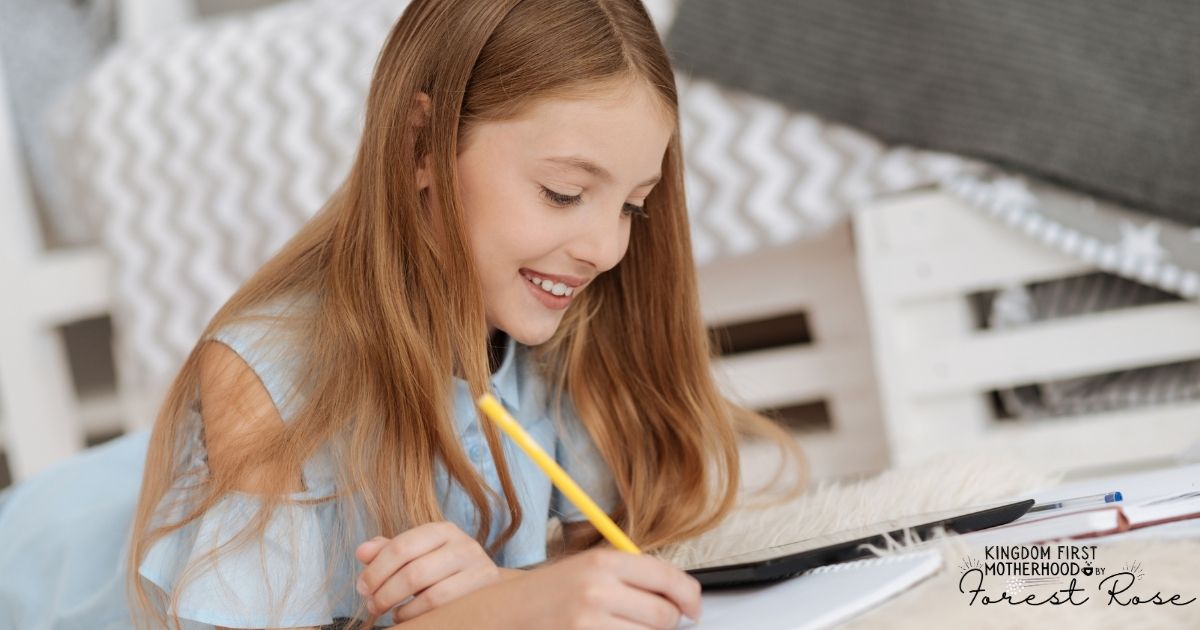 Girl working on spelling - Post on how to teach homeschool spelling