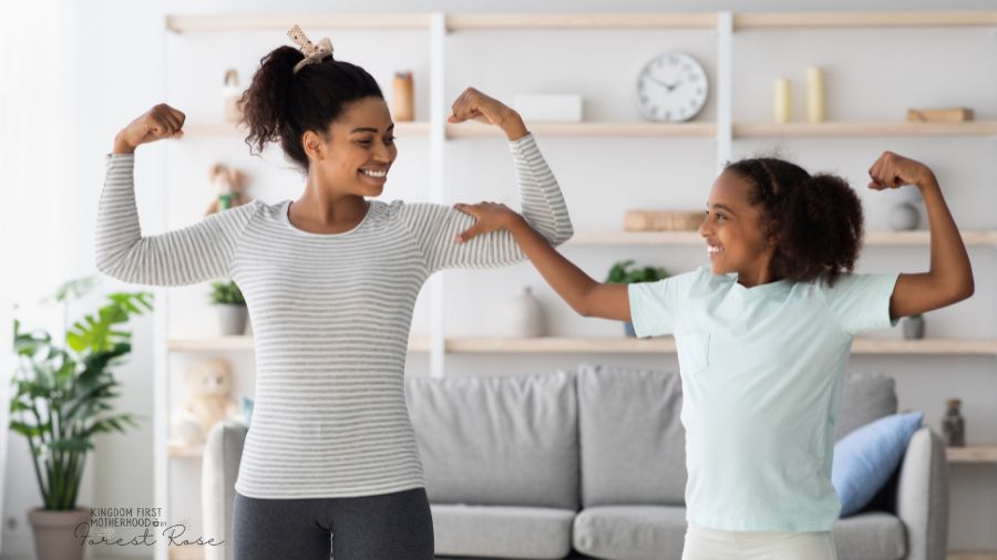 African American Mom and Daughter with strong arms