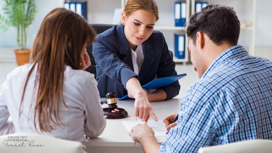 Couple filling out documents