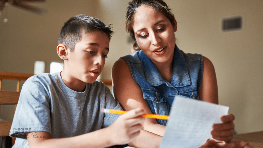 a mom helping her son with homework