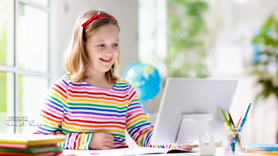 Young Girl working on Laptop